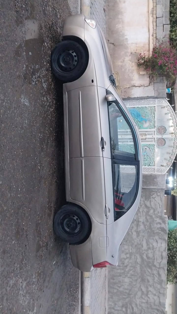 سلام عليكم سيراتو خليجي رقم بابل  نكليزي بأسمي مكينه وكير خير من الله ضرر جدا قليل جنطه ومعمره تبريد شغال ب59وبيهه مجال رقم ***********مكان واسط صويره
