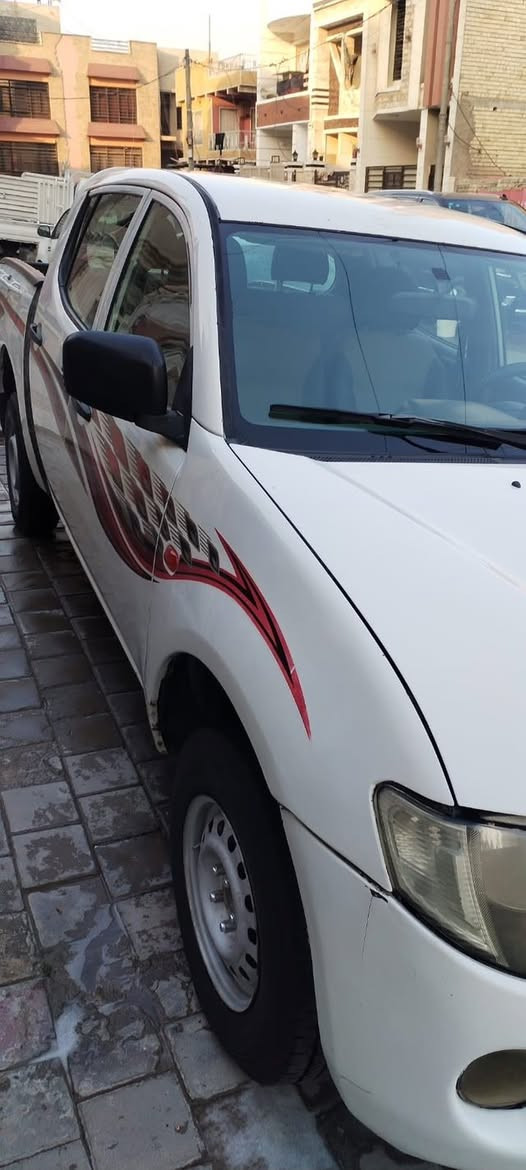 مستوبشي دبل قماره 2007 كير مكينه حداديه طخم تاير صبغ حزام جماليه رقم كربلاء  مشروع وطني تحويل ثاني يوم  *********** مكاني بغداد حي الامانه
