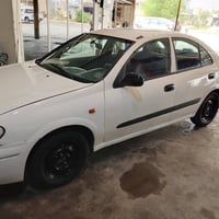 نيسان صني • ٢٠٠٤