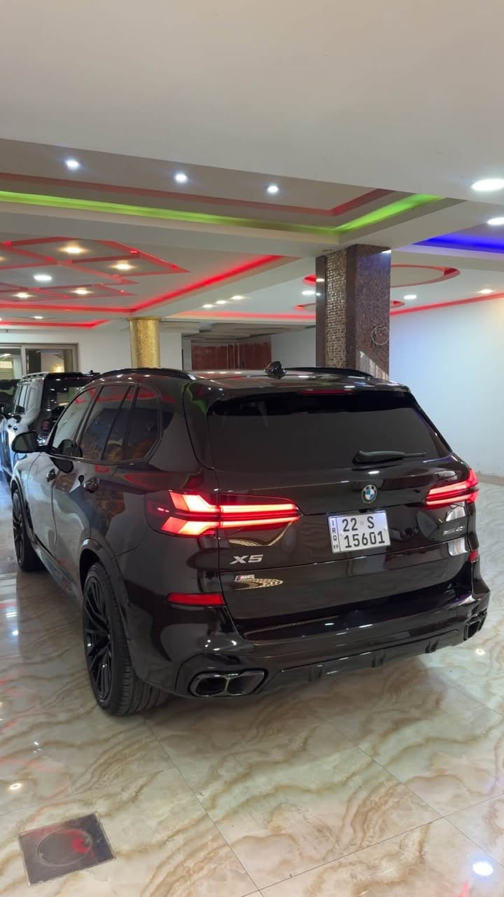🔥 للبيع BMW X5 موديل 2023 🔥
🇺🇸 وارد أمريكي مواصفات لكجري 
📅 الموديل: 2023
🛣️ الماشي: 53 ألف مايل
🚘 BMW X5 – SUV فخمة وقوية
السياره محدثه M  kit من الخارج 

✨ مواصفات السيارة:
• محرك 6 سلندر 3.0 تيربو حسب فئة xDrive40i
• قوة تصل إلى 335 حصان
• قير أوتوماتيك 8 سرعات
• دفع رباعي S.Drive
• شاشة ومولتيميديا BMW
• Apple CarPlay / Android Auto
• كاميرات عدد خمسه ٣٦٠ درجه 
• ⁠وحساسات امايه خلفيه 
• ⁠رادارات اوتو بارك وقوف تلقائي 
• فتحة سقف بانوراما
• مقاعد كهربائية مقاعد تدفه 
• تحكم بالمقود والسرعة
• تكييف أوتوماتيك
• أنظمة أمان ومساعدة للسائق
• إضاءة LED
• جنوط ألمنيوم
• تصميم رياضي وفخم من BMW X5

🔥 السيارة تجمع بين الفخامة، القوة، الراحة والهيبة
 🇺🇸 وارد أمريكي 
سياره بدون صبغ حادث السياره دعاميه اماميه طاك ايرباك ستيرن ومكانين بارد 

📍 الموقع: بغداد 
💰 السعر: 38.500$
📞 للاستفسار والتواصل: ***********

نص مكتوب في الصور:
- MARS MEDIA AGENCY
- Duhok, Iraq