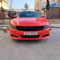 شباب جارجر امريكي  ٢٠١٧ لون برتقالي مميز رقم بغداد دولي بسمي داخله كلي...