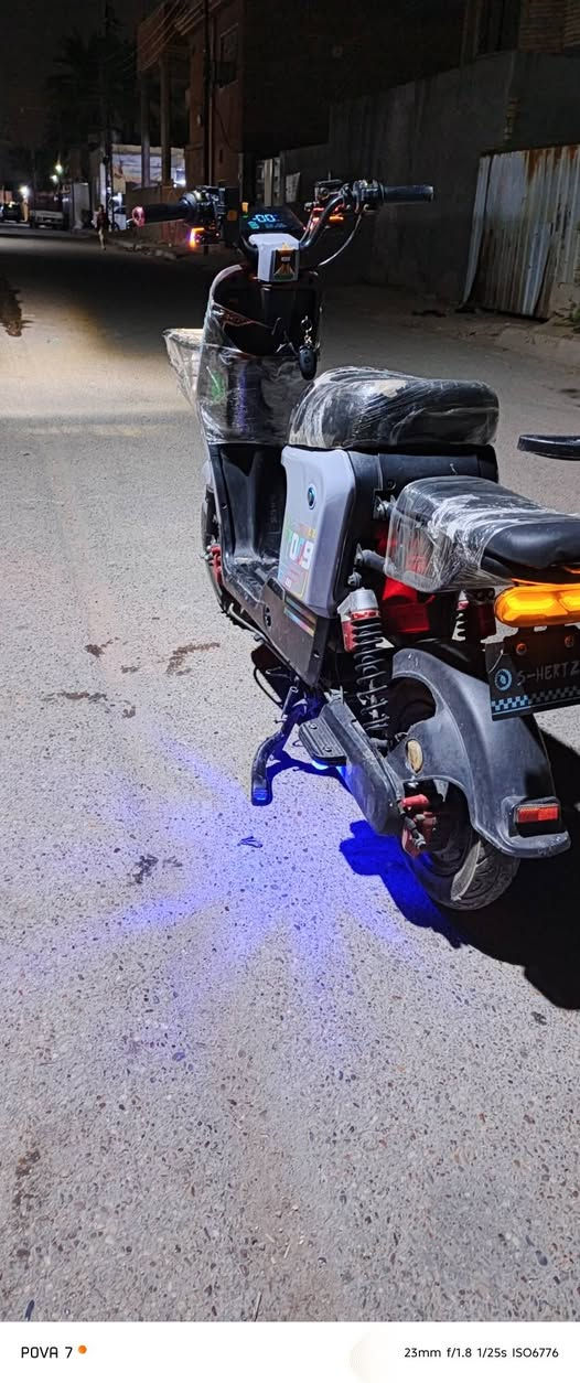 دراجه شحنR900 بطاريات عل فحص نضام بك منفذ يوسبي مسجل بلوتوث لايت عالي وناصي هورن اشاير سكن نشرات كهربايات كلها شغاله جديدة منزلها من الشركه الوصل موجود سعر 275وبيها مجال مكان بغداد خلف سيطرة الشعب رقم ***********

نص مكتوب في الصور:
- POVA 7 • 23mm f/1.8 1/17s ISO8578