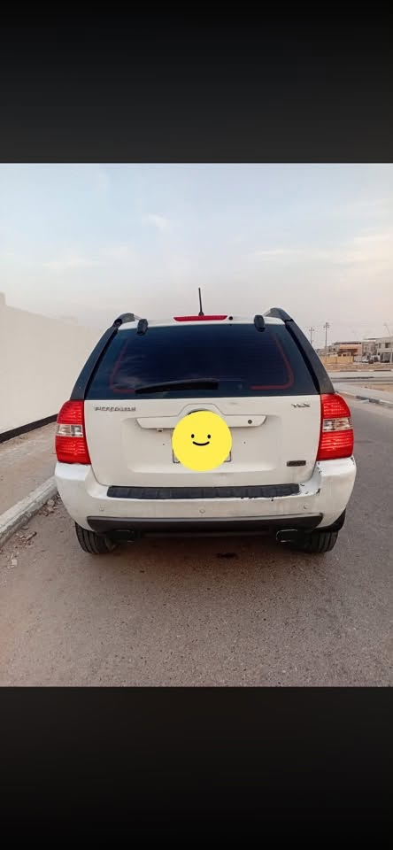 كيا سبورتج • ٢٠١٠ • كاز