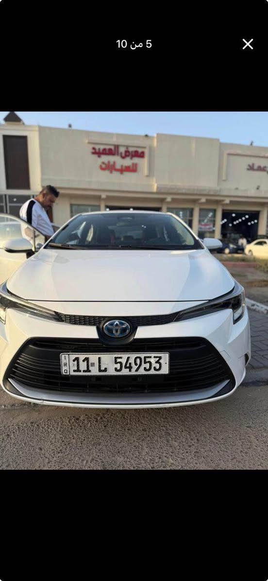 كورلا هايبرد • ٢٠٢٤ • جلد احمر