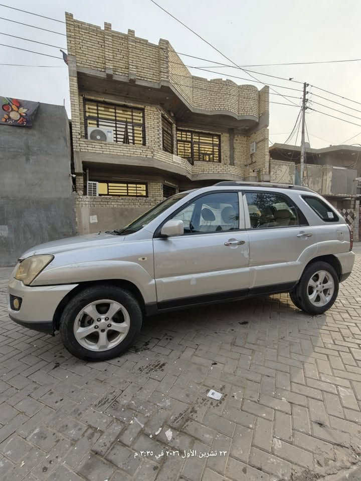 سبورتيج ٢٠٠٩ • موتور ٢٠٠٠ • ١٤٠٠٠٠ كم