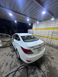 اكسنت 2013  خليجي رقم بغداد فول مواصفات بلو  محرك ال1600 دوش كير AT فت...