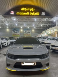 دوج جارجر GT PLUS    موديل 2022 لون مميز سموكي  محرك 3600 V6 رقم بغداد...