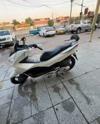 دراجه pcx للبيع مكفوله كفاله عامه جديده مابيها نقص ماشيه 37 الف جديده ...