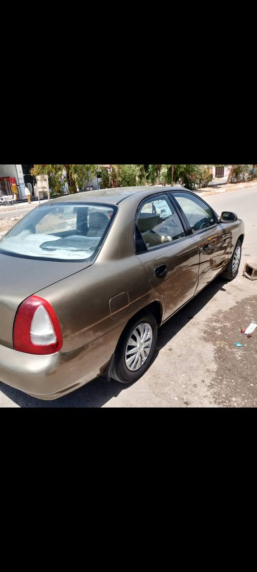 دايو نوبرا موديل 98
رقم كركوك مشروع وطني محرك گير شرط بسمي
تبريد ثلج
صدر تايرات جديد دبلات جديد
بدون اي نقص سياره باتري جديد 
دوشمه كامل قفل مركزي 
جام كهربائي سعر 45بي مجال بصيط 
***********
