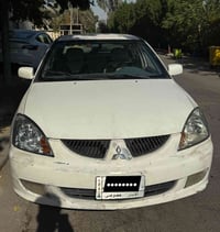 لانسر 2006 • محرك 1.6 • انبار خصوصي