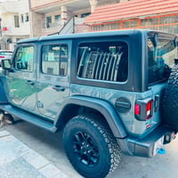 جيب رانكلر موديل 2024 محرك 2000تيربو+هايبرد ماشية23الف ميل ضربة السيار...