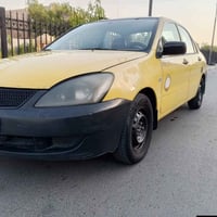 لانسر ٢٠١٠ • رقم بغداد • ما بيها ضربه
