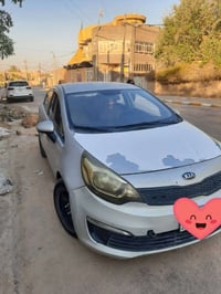 كيا ريو مديل 2016 سياره بسمي رقم بابل لون سلفري سياره بيه طخات بسيطه ب...