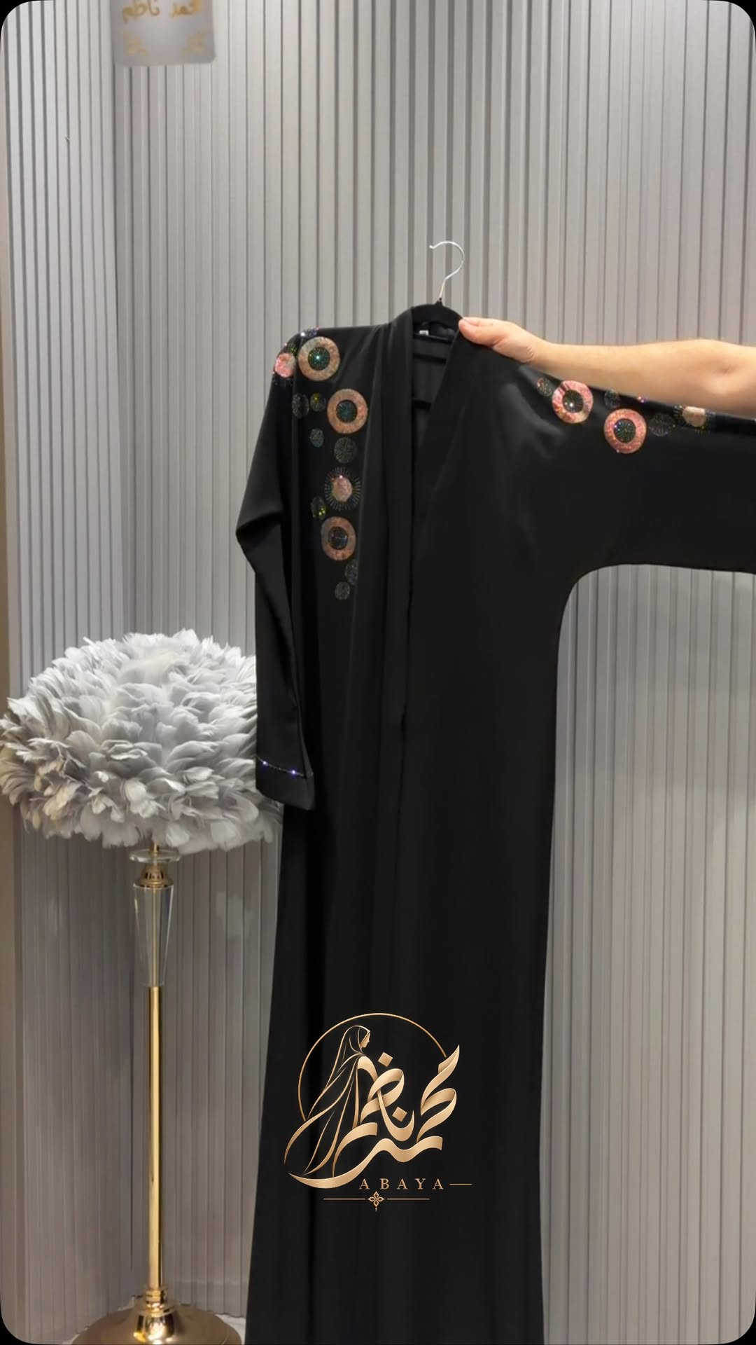 

نص مكتوب في الصور:
- احمد ناظم
- ABAYA