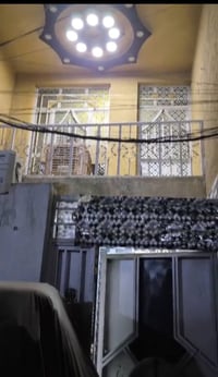 نصف قطعة • ٧٢م • قرب مدرسة أكد