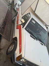 مكينة جديدة • بيك اب أبيض • موديل ١٩٩٢