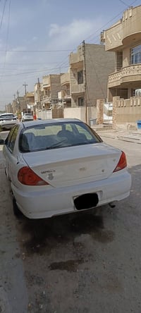 السلام وعليكم كيا سيفيا موديل 2002 رقم بغداد الماني نقصها تبريد كير او...