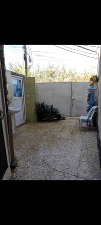 100م للبيع طابو زراعي سند 25 بناء حديث كله طابوق وشيش يحتوي على غرفه ن...