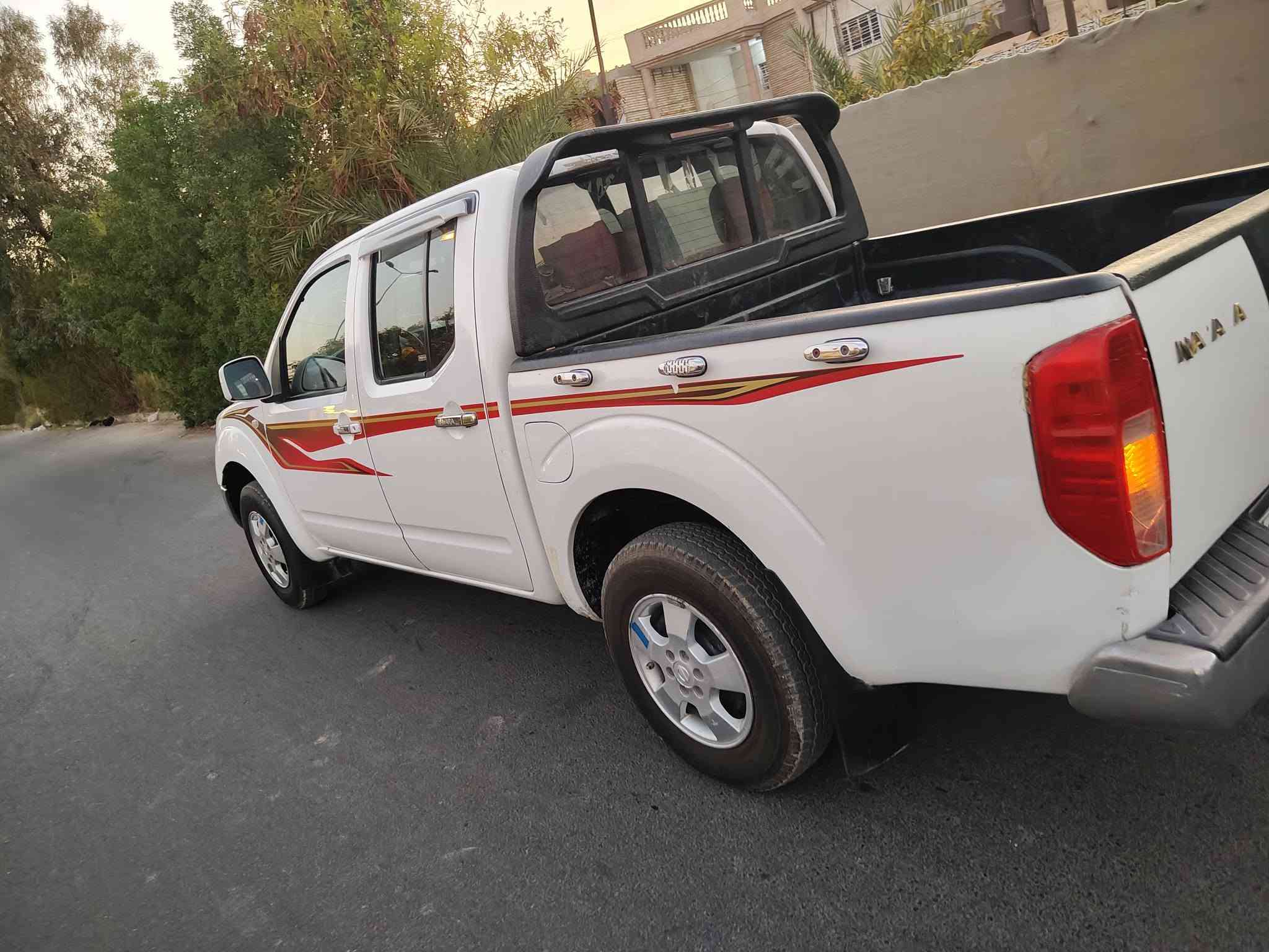 نيسان نافاره 2009 كير عادي 
سياره نضيفه محرك جديد  صدر جديد 
تبريد ثلج رقم اربيل  رقم صاحب السياره
***********
