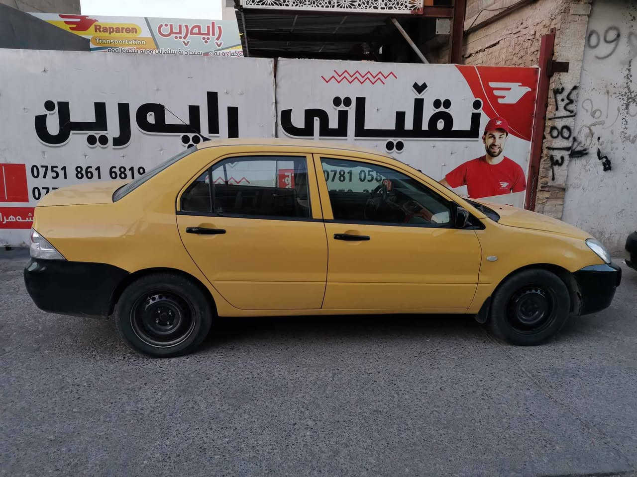 لانسر تاكسي • ٢٠١٠ • رقم بغداد