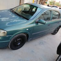 وبركاته للبيع اوبل استرا 2002 بغداد انكليزي وبسمي كير ومحرك مكفول تخم ...