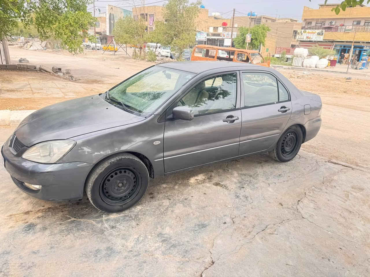لانسر ٢٠١١ • رقم بغداد • تحويل مباشر