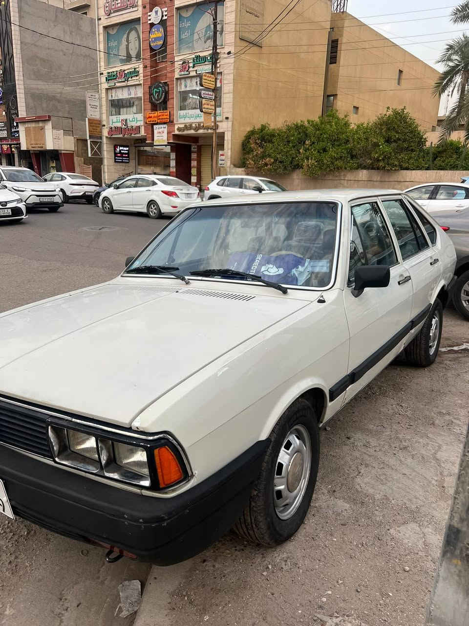 برازيلي ٨٧ • ابيض • رقم بغداد