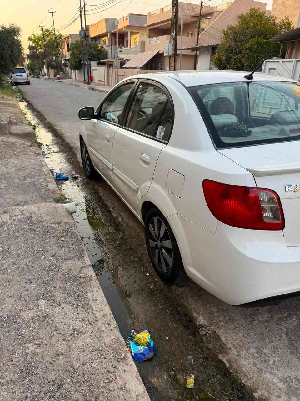 ريو 2012 رقم بغداد مشروع وطني محرك كير شرط حجم 1400 تدفئة تبريد تحكمات ستيرن اشاير بالمري شاشة مع شاشة خلفية بيها قطعتين صبغ موجودة بالسونار سعر $83 للاستفسار الجانب الايسر ***********
