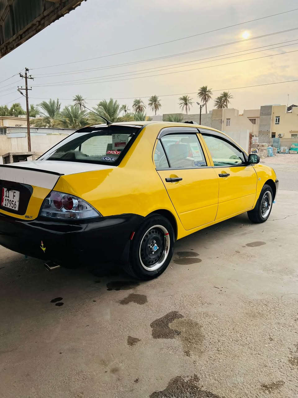 لانسر ٢٠١٠ • رقم بغداد • مكيف شغّال