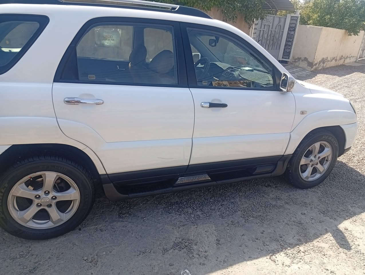 كية سبورتج موديل ٩ مكفولة كير ومحرك سونار موجود مكان سيارة صلاح الدين بلد محرك ٢٠٠٠ سيارة متصرف علية  *********** رقم بغداد بسمي
