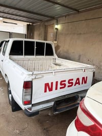 نيسان • مزاد • ٢٠٠٣