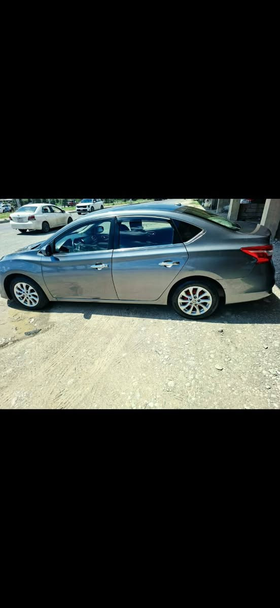 🔥 للبيع نيسان سنترا 🔥
🚘 Nissan Sentra SV 2019
 🔹 محرك 1.8 لتر
 🔹 أوتوماتيك CVT
 🔹 لون نفطي
 🔹 رادار أمامي وجانبي
 🔹 بصمة تشغيل
 🔹 فتح وغلق الأبواب والجنطة بالبصمة
 🔹 نظام قيادة Sport / Eco
 🔹 مقود كهربائي
 🔹  تبريد وتدفئة لمس
 🔹 شاشة لمس
 🔹 داخلية نظيفة ومرتبة
 🔹 اقتصادية بالوقود
 سيارة مرتبة ومواصفاتها حلو وارد امريكي3N1AB7APOKY221063
حادثها بامريكا قطعة واحد جاملغ السكن (عكس السايق ) و بكوردستان  باب ورا السايق مصبوغ وشبر معجون عندي صور الحادث للمصداقية وباب سايق مبدل بلادي مو صبغ السيارة ابيعها بشرط نظافة المحرك والكير مكفولين حجر بيئة موجود كامل ولا كلوب شغال ولا دينار تحتاج مصرف   سنوية جديدة هزة جديدة شرط تحويل باسمك سعرها 113 ورقة متواجد باربيل 
*********** أربيل, العراق

نص مكتوب في الصور:
- S25+