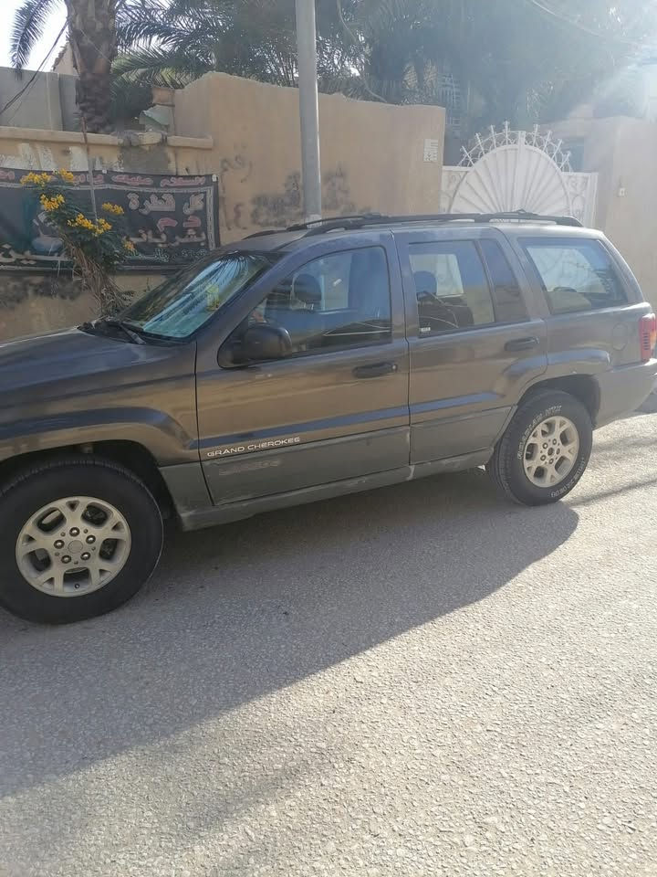 جيب شيروكي كراند موديل. 2000 رقم. ديالى. مشروع وطني بسمي. تحويل مباشر.  كير ومكينه بشرط. نظافه.  كامله. فقط. بيه. ترتيب كهربائيات   *********** 
***********
