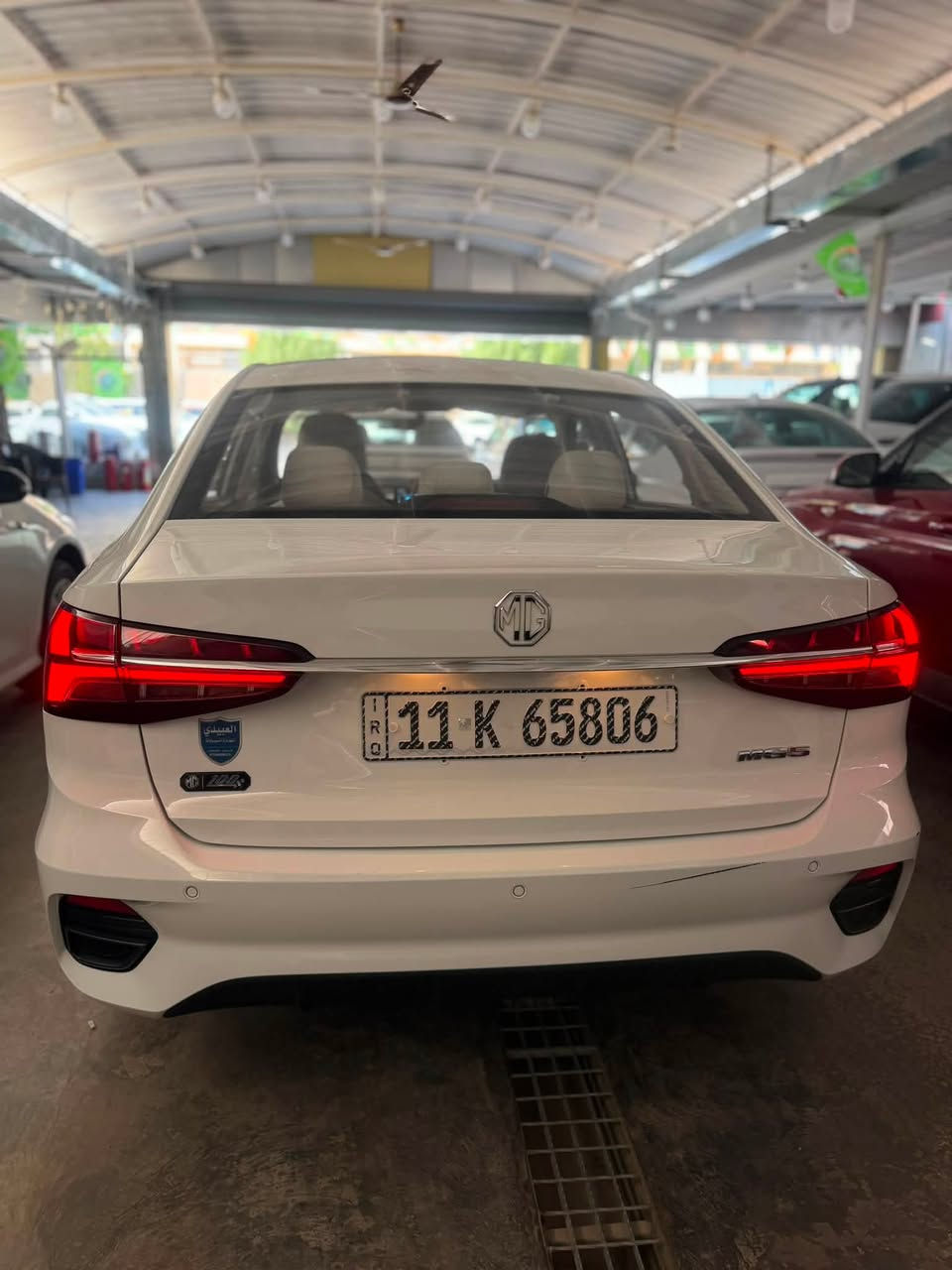 Mg5   
مديل  ٢٠٢٥ 
رقم بغداد بسمي 
ماشيه 5  الف 
مكفوله كفاله عامه 
مكينه 4 سلندر 1500cc 
كشنات مخمل ابيض
مواصفات معروفه
تبريد قطعتين 
كروز سرعه 
سايد بريك بصمه
بصمتين بل سياره 
حساس خلفي 
حساسات اطار
تبريد لمس
ويل كب 
فول تحكم ستيرن 
اربع بصمات تشغيل وفتح ابواب وصندوك
لد نهاري 
مري كهرباء  
  اشاير بـ المري  
منفذ شحن سریع مزدوج Type-C

السعر 122 ورقه وبيها مجال 
***********
