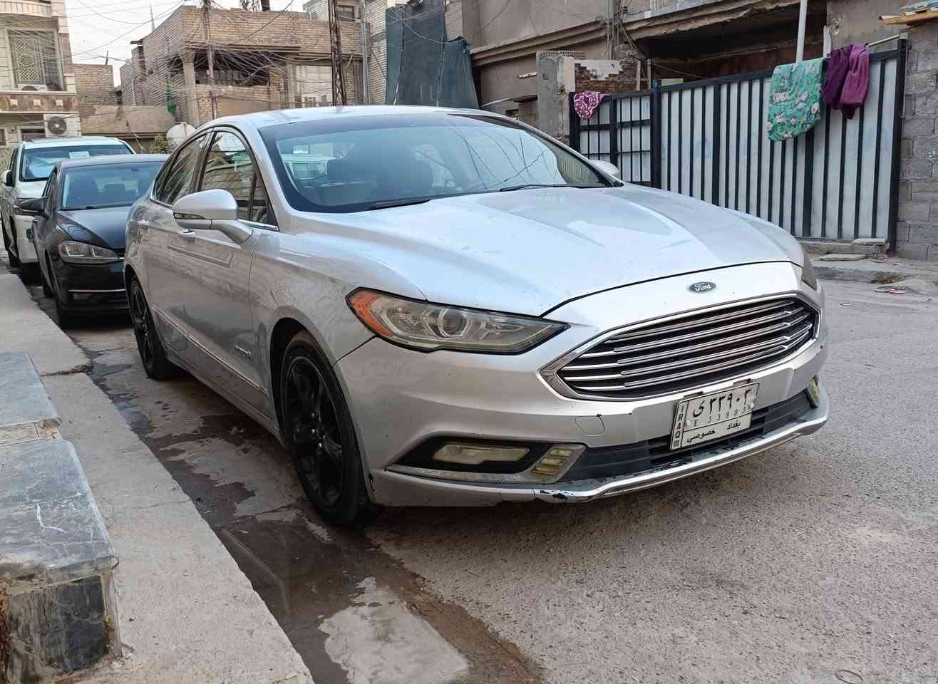 السعر 76 ورقه للبيع فقط بدون مراوس ولاقسط 
فورد فيوجن هايبرد موديل 2018 رقم بغداد 
للاتصال *********** و
محرك 2000 تنفس طبيعي محرك وكير نظاف
التبريد والتدفئه شغالات
بصمه .شاشه . كاميرا تحكم استيرن 
صدر وتخم تاير نظيف
وادر امريكي حادثها جهة اليسار تبديل 3 قطع نفس اللون بدون دواخل شواصي لغود مكفولات 
وصبغ قطعتين بنيد وجاملغ خلفي صورة السونار موجوده ويا الصور 
المكان بغداد الزعفرانية
