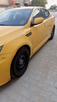 اوبتيما • ٢٠١٢ • جي دي اي ٢٤٠٠