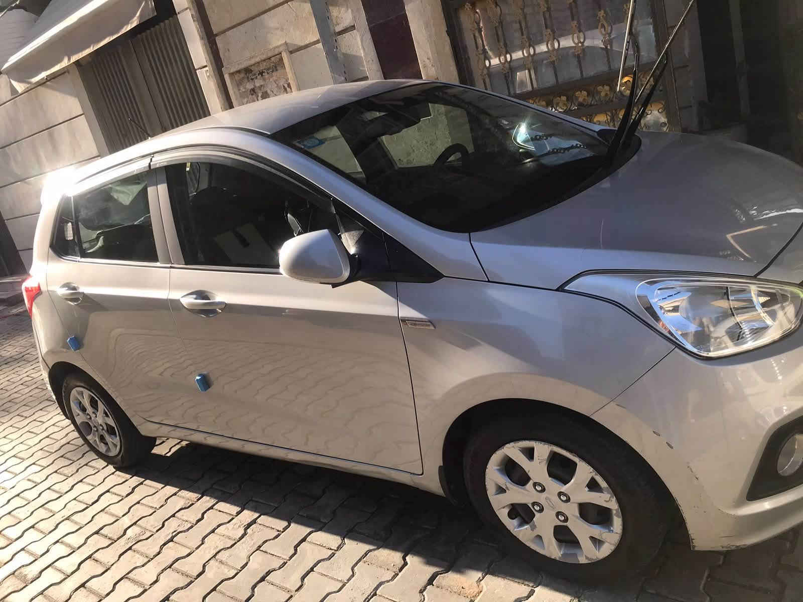 سياره هونداي كوري خليجي اي تين مكفوله بإسمي رقم بغداد ماشيه ٤٠ سبير مانازل مكفوله من كل شي فقط شي شخط بارد باقي قليل مديل ٢٠١٤ مري شفط كامرتين وحده في الجامه العليا وكامره اندرويد الاصليه من امها سويجات ريموت عدد ٢ واي استفسار موجود محرك ١٢٠٠ مالها الاصلي***********
