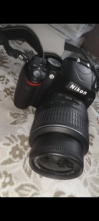 نيكون D5100 • عدسة 18-55 • نظيف ٩٩٪