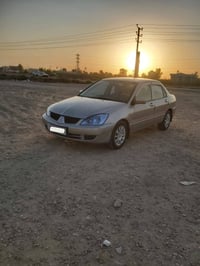 لانسر ٢٠١٠ • ماتور ١٦٠٠ • ماشيه ١٥٥٠٠٠