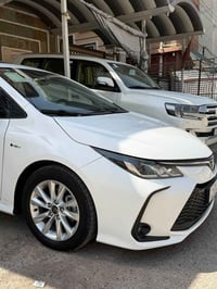 تويوتا كورلا هابيرد  الشكل خليجي  موديل 2025 ماشيه 10تالالف ‏كفاله عام...