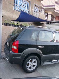 توسان 2009 رقم بغداد خليجي كاملة من كلشي نقص فقط غاز تبريد مكان السيار...