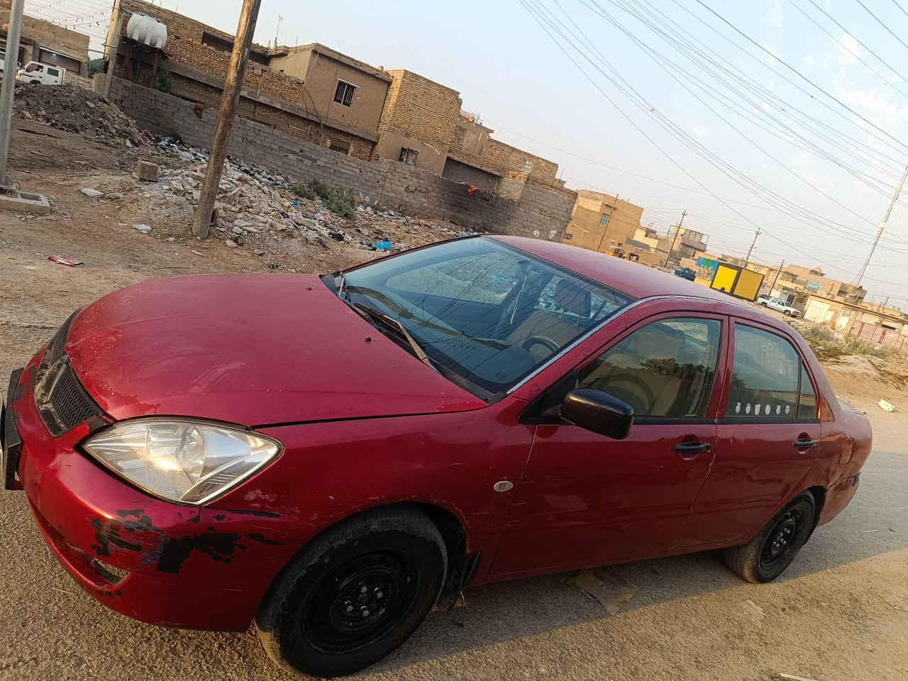 لانسر 2007 ،، رقم بغداد مشروع وطني بأسمي ،، مصبوغة حزام و  المحرك تجفيت قبل 6 اشهر و الگير ما مفتوح ،، حدادية جديدة و الباتري جديد 
مكاني الفضيلية ***********
السعر 58
