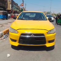 لانسر موديل 2016 مكينه 1600 اقتصاديه السونار مرفق بلصور رقم جديد باسمي...