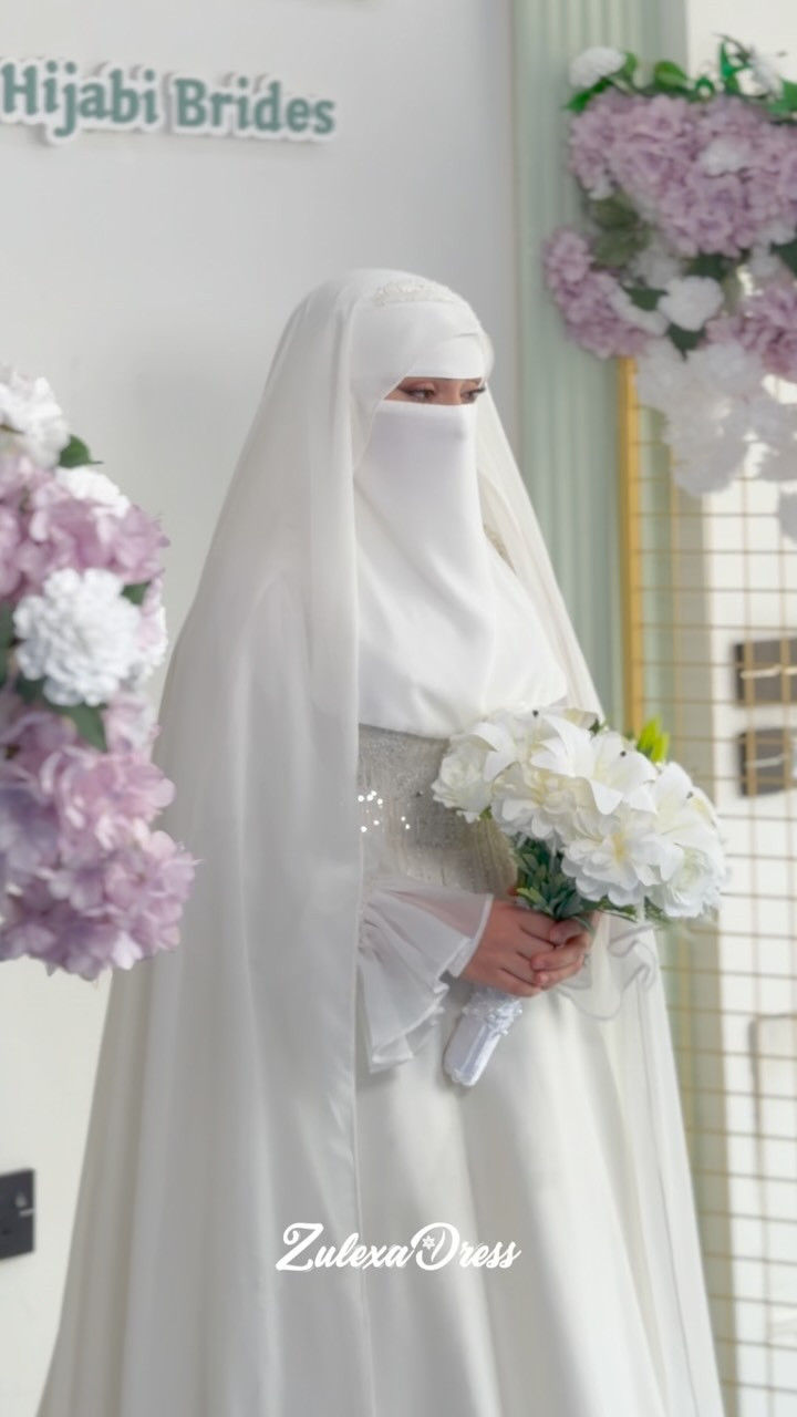 بارك الله لك، وبارك عليك، وجمع بينكما في خير

ماشاءلله لە بووک و زاوای جوانی ئێمە 🕊️🥹

‏#Erbil
‏#Iraq
‏#Kurdistan
‏#ErbilFashion⁩⁩⁩⁩⁩

نص مكتوب في الصور:
- Hijabi Brides Zulexa Dress
