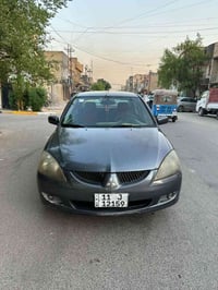 لانسر بومه • ٢٠٠٧ • محرك ٢٠٠٠