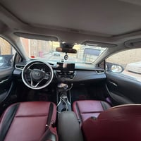 كورلا هايبرد • ٢٠٢٤ • داخل احمر جلد