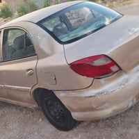 كيا ريو للبيع الموديل 2001 رقم بغداد السنوية كارتونيه طرف ثالث حرف الف...
