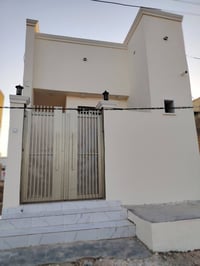 النجف الأشرف • ١٠٠م • بيت على ساحة