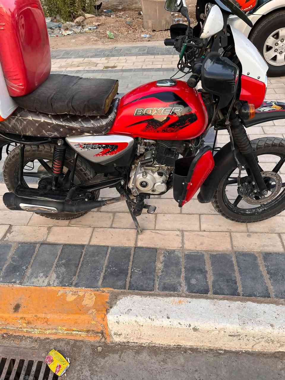 بوكسر 2023 جبلي مرقم بغداد انكليزي تحويل ثاني يوم مباضر دراجه كامله مكمله كهربائيات شغاله محرك (مجفت شركة)  دراجة تاخذها وتشغل على باب لله  سعرها 2300 مليونين و300 وبيها مجال للشراي مكاني بغداد الدورة للاستفسار ***********
