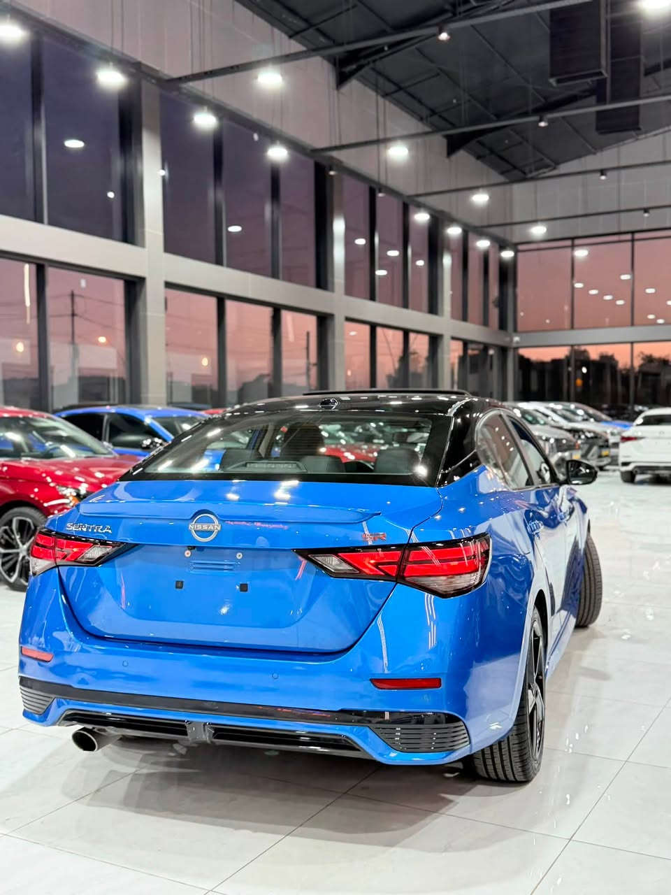 🔥 نيسان سنترا 2024 SR Plus 🇺🇸
بدون صبغ بدون ارباك فقط جاملغ سكن كلير امريكا 
إذا تريد سيارة شكل رياضي، اقتصادية، ومواصفاتها مرتبة… السنترا SR Plus اختيار قوي 👌

🚗 محرك 2.0 لتر 4 سلندر
⚙️ كير CVT أوتوماتيك
🏁 فئة SR Plus بستايل رياضي مميز
💡 إنارة LED
🛞 ويل رياضية
🕷️سقف اسود 
🎼 نضام صوتي سماعات BOSE
📱 شاشة مع Apple CarPlay و Android Auto
🛋️ داخلية مرتبة ومريحة
🛡️ أنظمة أمان ومساعدة للسائق
⛽ اقتصادية بالبنزين ومناسبة للاستخدام اليومي

✨ سيارة عملية ومرتبة، وبنفس الوقت شكلها شبابي ورياضي.

📍 متوفرة للبيع – أربيل
📞***********
بدون رقم تترقم جميع محافظات كردستان
السعر بلاش جوه السوك 148$ وبيها مجال
